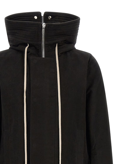 This Hooded Parka by Rick Owens for men in cotton black presents a utilitarian silhouette, meticulously detailed with pockets & hooded and a utilitarian hooded neckline for a sophisticated, weather-ready look.