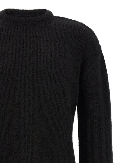 Cardigan by Rick Owens for men in cashmere silk black features a nuanced silhouette with a refined crew neckline and nuanced detailing for a sophisticated look.