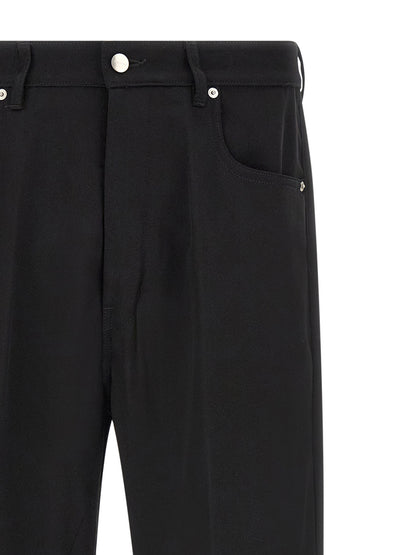 Jeans by Rick Owens for men in denim cotton black & silver presents a tailored silhouette, showcasing a tailored relaxed-fit & wide and long cut with a refined for a truly tailored aesthetic.