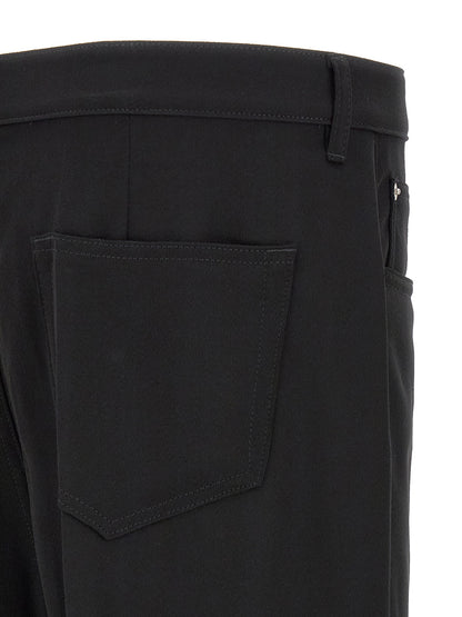 Jeans by Rick Owens for men in denim cotton black & silver features a refined silhouette with a refined relaxed-fit & wide, defined by a and a refined long for a refined finish.
