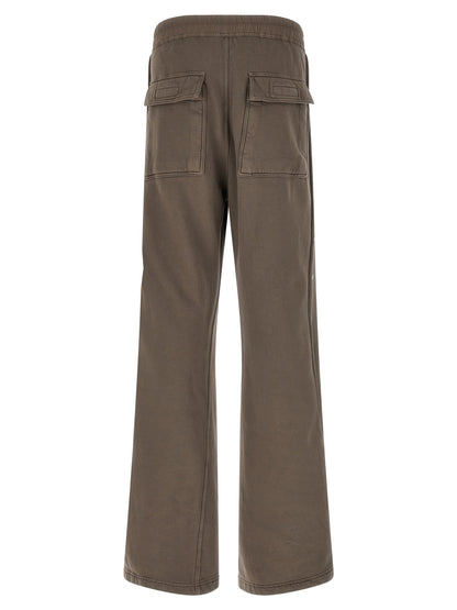 Trousers by DRKSHDW for men in cotton gray features a sculptural silhouette, showcasing a sculptural flared & wide and long with a sophisticated for a sculptural finish.