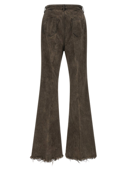 Jeans by Rick Owens for men in denim cotton gray & silver presents a refined pantology silhouette, artfully defined by a refined pantology flared & bootcut, long, and a sophisticated high rise.
