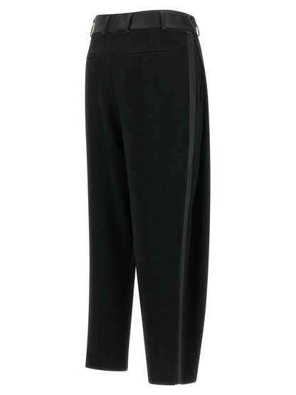 Trousers by Alberto Biani for women in polyester satin black features an on trend silhouette, showcasing a sophisticated cropped with a cropped and for an on trend finish.