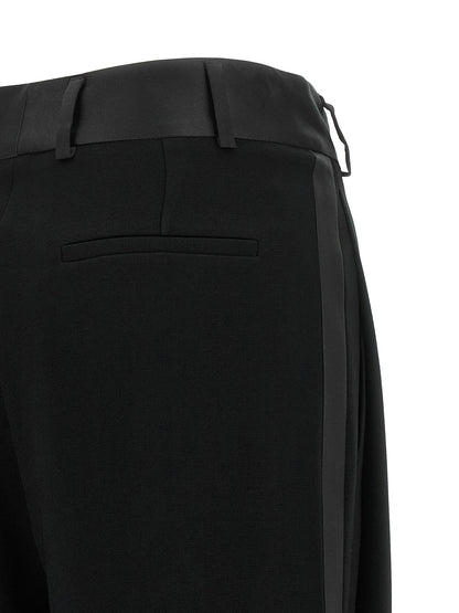 Trousers by Alberto Biani for women in polyester satin black features a sculptural silhouette, showcasing a sculptural cropped and cropped with a sophisticated for a sculptural finish.