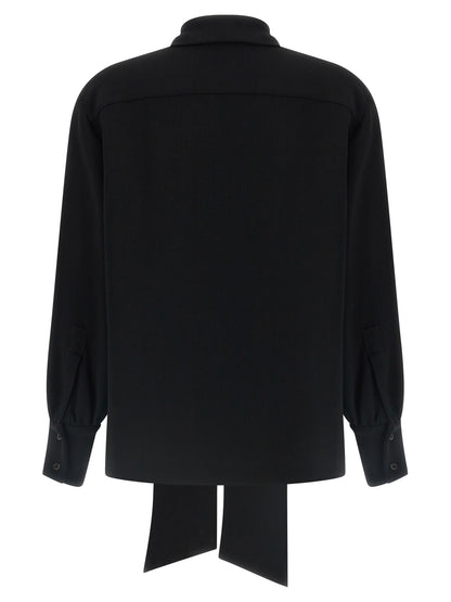 Blouse by Alberto Biani for women in polyester black presents a discerning silhouette, showcasing a sophisticated v-neck neckline and for a truly discerning finish.
