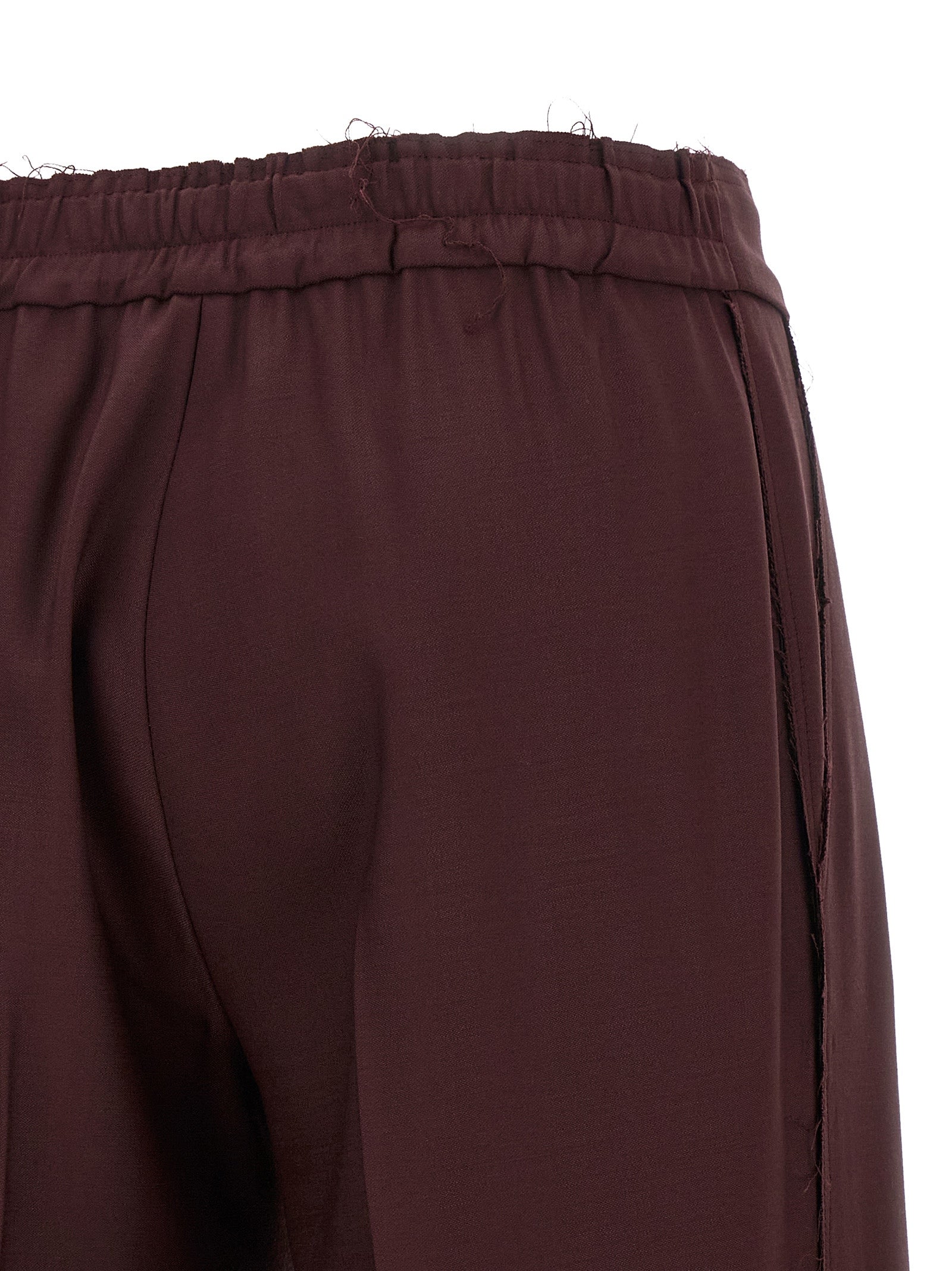 Trousers by Gianluca Capannolo for women in polyester purple presents a smart silhouette, meticulously detailed with a smart wide, a smart long, and a smart .
