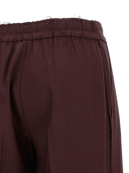 Trousers by Gianluca Capannolo for women in polyester purple presents a smart silhouette, meticulously detailed with a smart wide, a smart long, and a smart .