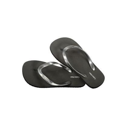 Flip-Flop Sandals by Calvin Klein for women in polyurethane black & print features an statuesque silhouette from the Women's Polyurethane Flip-Flop Sandals collection, showcasing a statuesque and elegant .