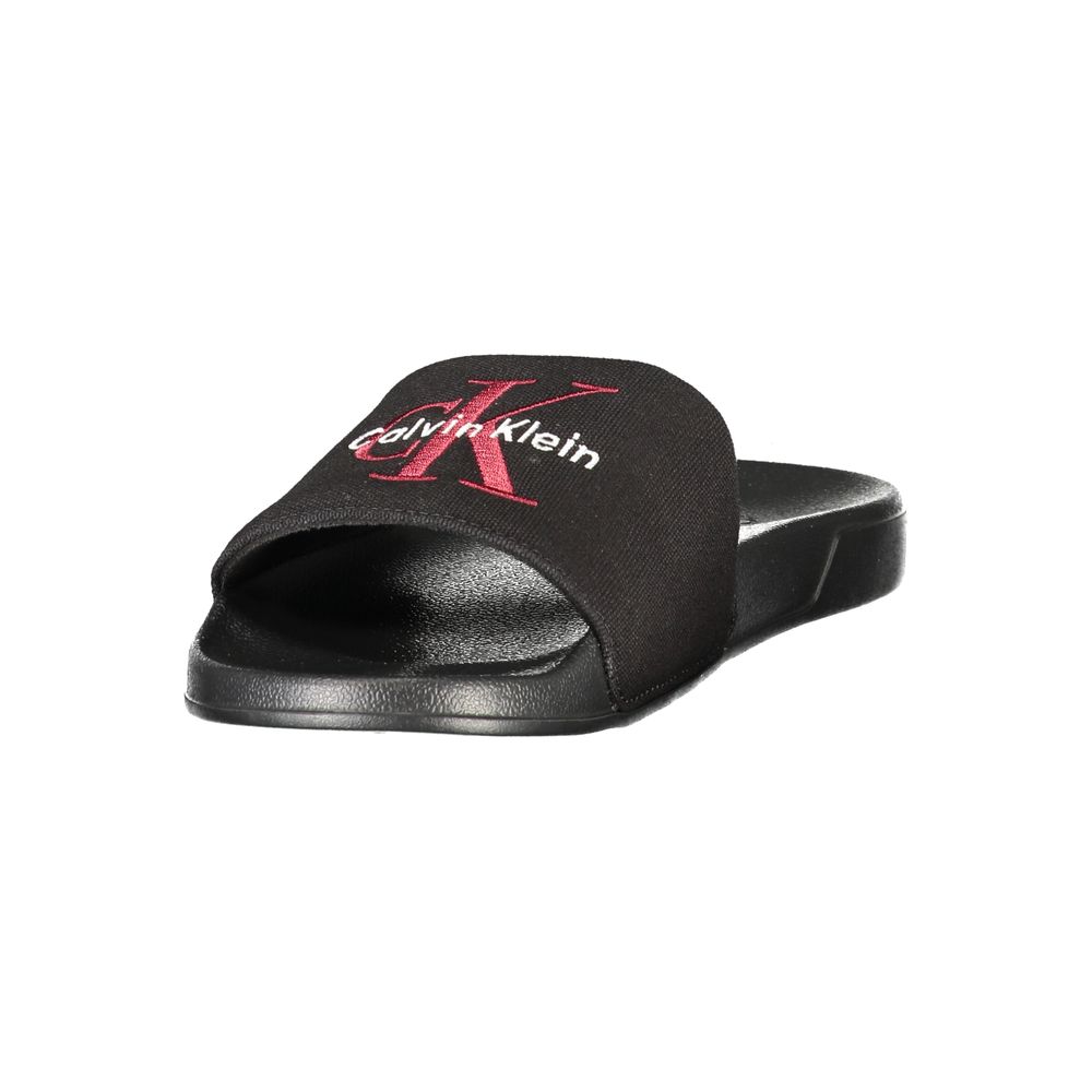 Slider Sandals by Calvin Klein for men in polyester polyurethane cotton black features an architectural silhouette, showcasing the architectural Men's Polyester Polyurethane Cotton Slider Sandals with a and .