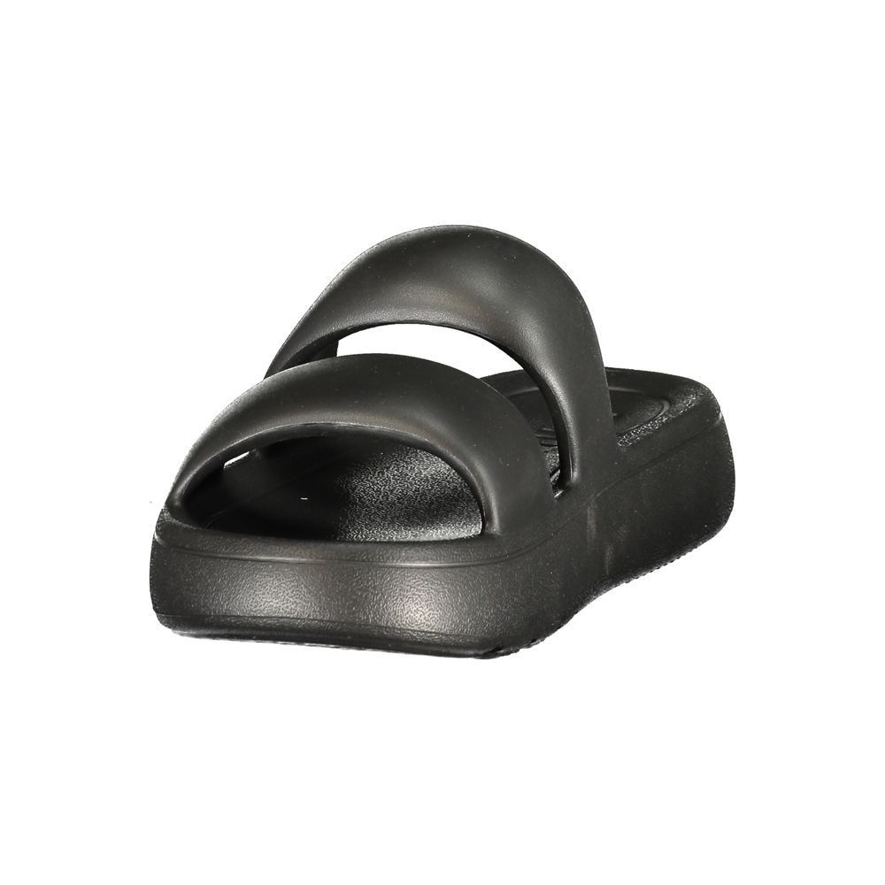 Flat Slider Sandals by Fila for women in polyurethane black & print features an statuesque silhouette from the Women's Polyurethane Flat Slider Sandals collection, showcasing a statuesque flat and elegant .