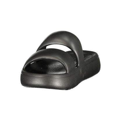 Flat Slider Sandals by Fila for women in polyurethane black & print features an statuesque silhouette from the Women's Polyurethane Flat Slider Sandals collection, showcasing a statuesque flat and elegant .