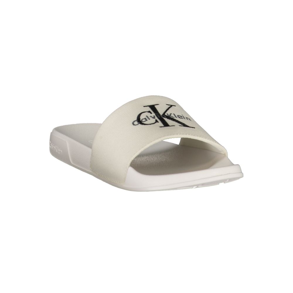 Sandals by Calvin Klein for women in polyester & polyurethane black & white features an statuesque silhouette from the Women's Polyester & Polyurethane Sandals collection, showcasing a statuesque and elegant .