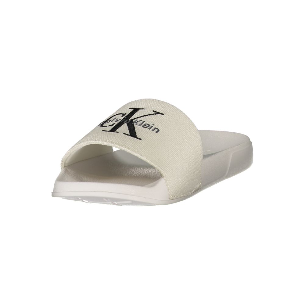 Sandals by Calvin Klein for women in polyester & polyurethane black & white features an statuesque Women's Polyester & Polyurethane Sandals silhouette with a refined and elegant .