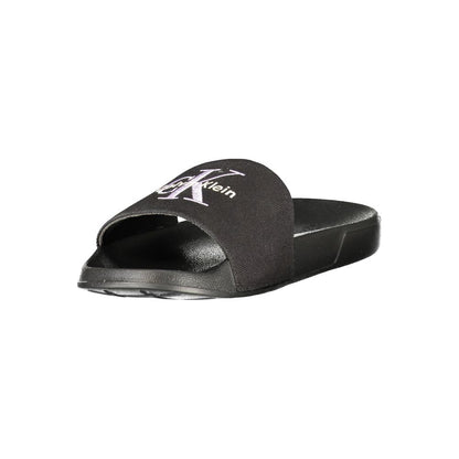 Flat Sandals by Calvin Klein for women in plush polyester polyurethane black features an architectural design from the Women's Plush Polyester Polyurethane Flat Sandals collection, defined by a architectural flat and for a architectural finish.