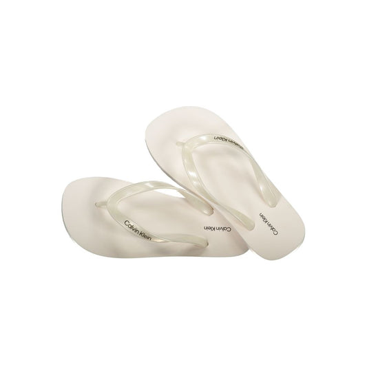 Flip-Flop Sandals by Calvin Klein for women in polyurethane white showcases a sculptural silhouette as City Women's Polyurethane Flip-Flop Sandals, defined by a sculptural and sculptural for a sculptural look.