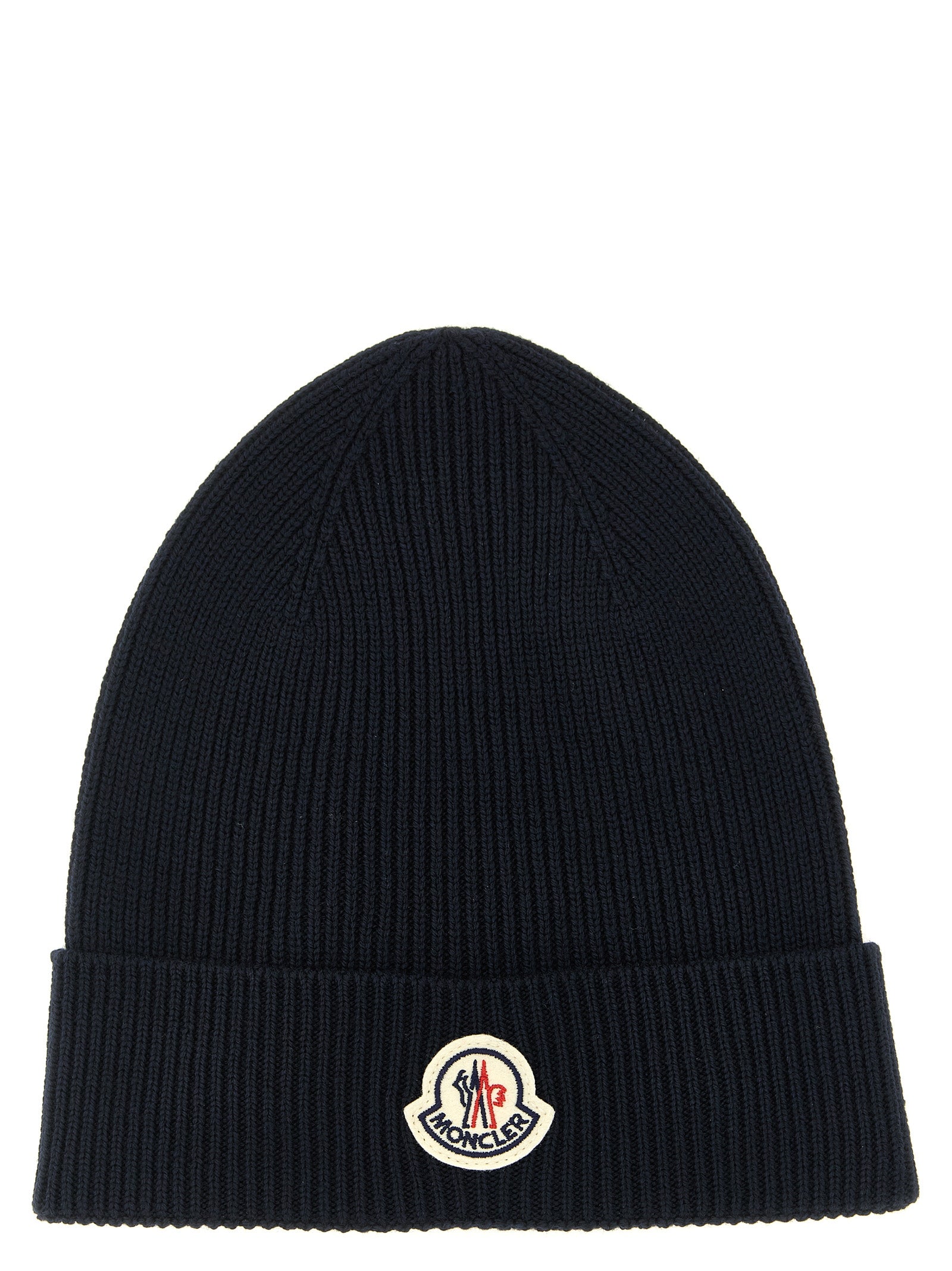 Beanie Hat by Moncler for men in virgin wool felt navy presents a urban-chic silhouette, showcasing the urban-chic craftsmanship of this Virgin Wool Felt Beanie Hat.