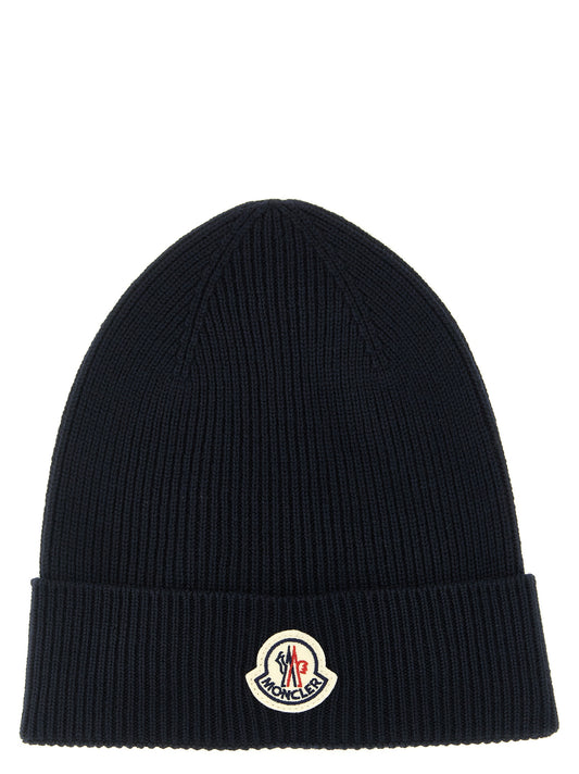 Beanie Hat by Moncler for men in virgin wool felt navy presents a urban-chic silhouette, showcasing the urban-chic craftsmanship of this Virgin Wool Felt Beanie Hat.