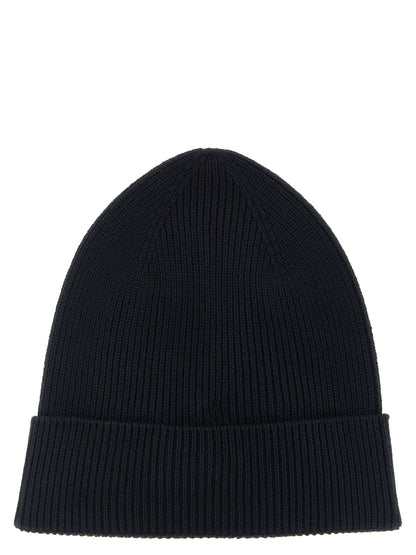 Beanie Hat by Moncler for men in virgin wool felt navy features a distinguished knit construction, showcasing the sophisticated silhouette and distinguished finish of the Virgin Wool Felt Beanie Hat.