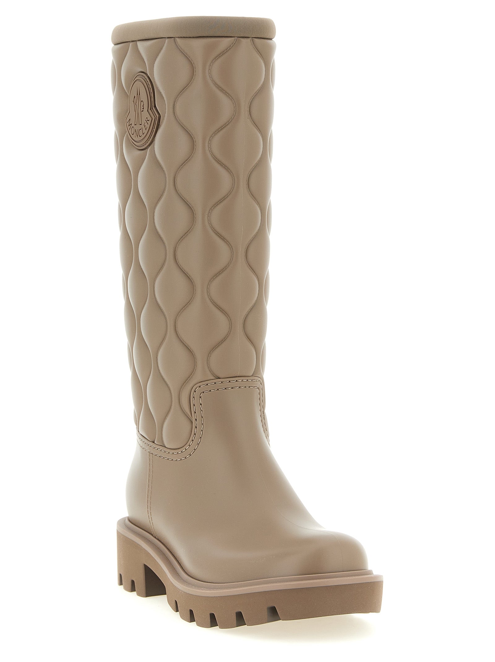 Over-The-Knee Boots by Moncler for women in pvc & neoprene beige & patterned showcases a ergonomic silhouette from the Women's PVC & Neoprene Over-The-Knee Boots collection, featuring a ergonomic and a ergonomic .