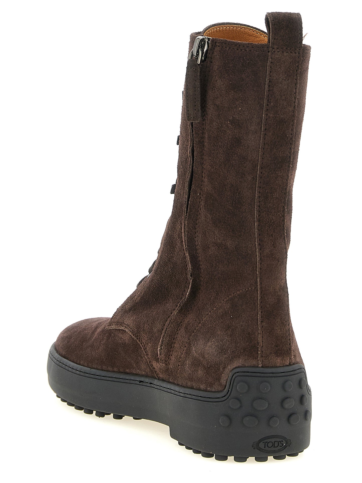 Lace-Up Ankle Winter Boots by Tod's for women in calfskin leather brown features an effortless chic silhouette from the Women's Calfskin Leather Lace-Up Ankle Winter Boots collection, showcasing a effortless chic and refined for an effortless chic look.