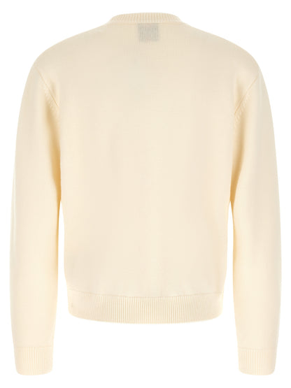 Cardigan by Casablanca for men in wool cream & white presents a textural silhouette, artfully finished with a textural round neckline and for a sophisticated, textural look.