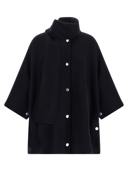 This Cape by PINKO for women in polyamide & wool blue & silver presents a voluminous silhouette, showcasing refined and a sophisticated turtle neckline for a voluminous finish.