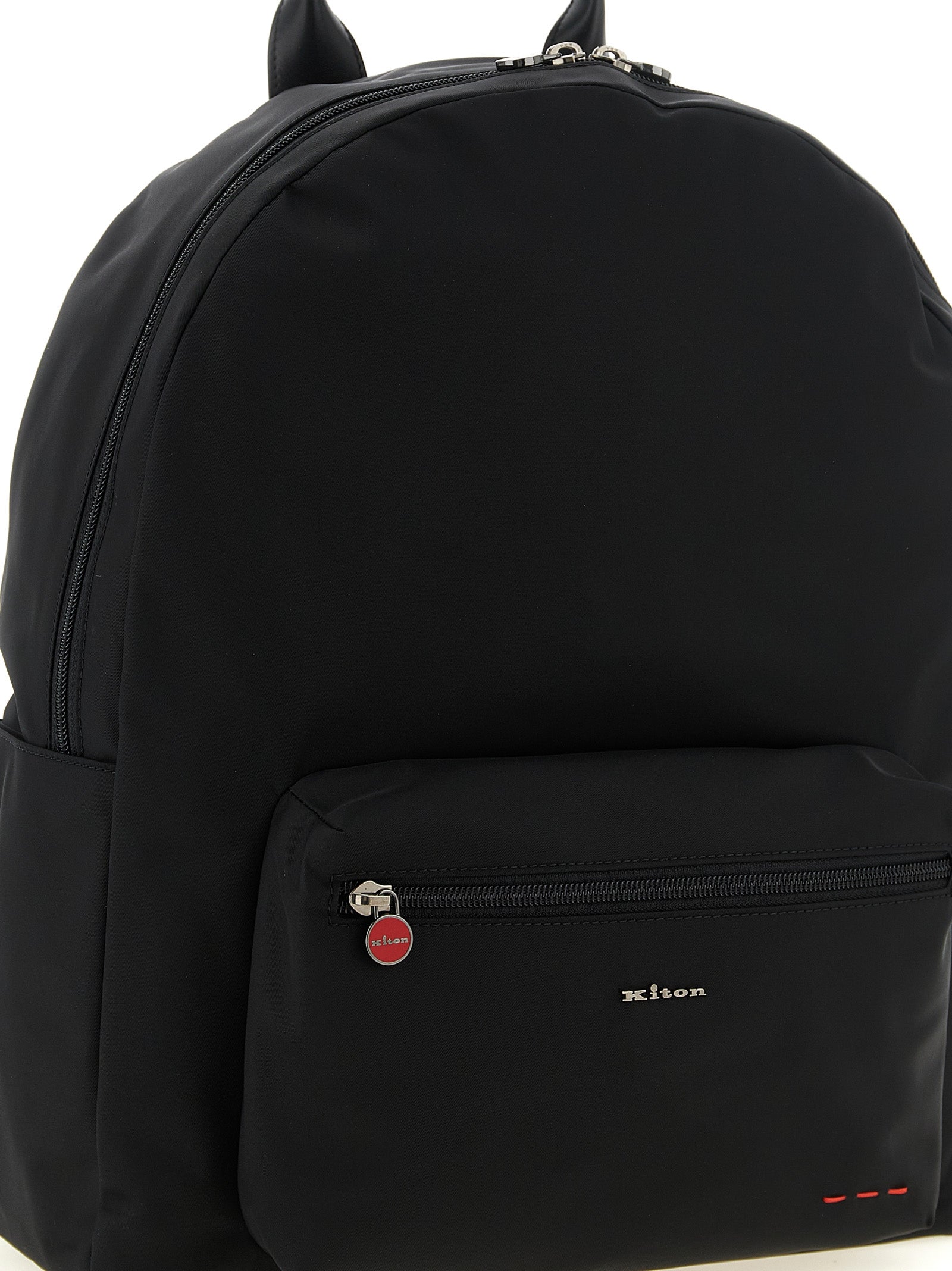Backpack by Kiton for men in polyamide leather & canvas black & red features an ultra-portable silhouette from the Polyamide Leather & Canvas Backpack range, with a secure zipper, ample external-pockets, and versatile handle, backpack-strap & adjustable-strap.