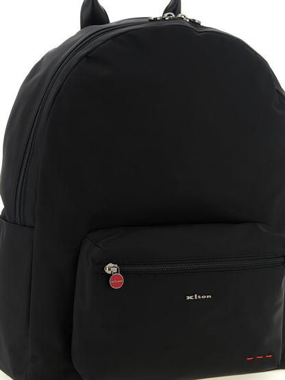 Backpack by Kiton for men in polyamide leather & canvas black & red features an ultra-portable silhouette from the Polyamide Leather & Canvas Backpack range, with a secure zipper, ample external-pockets, and versatile handle, backpack-strap & adjustable-strap.