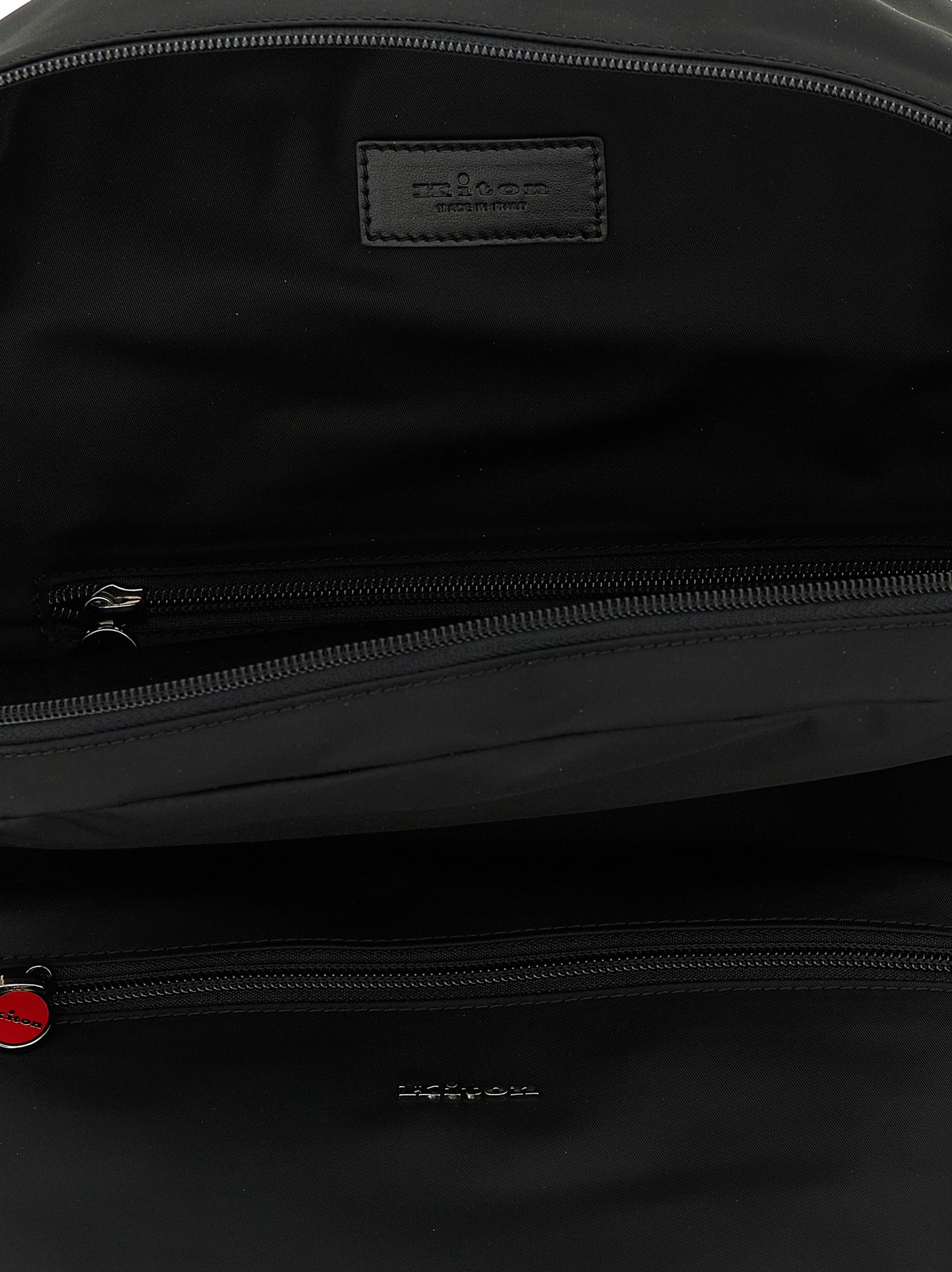 Backpack by Kiton for men in polyamide leather & canvas black & red features a utilitarian chic Polyamide Leather & Canvas Backpack design with a secure zipper, ample external-pockets, and versatile handle, backpack-strap & adjustable-strap for a utilitarian chic finish.
