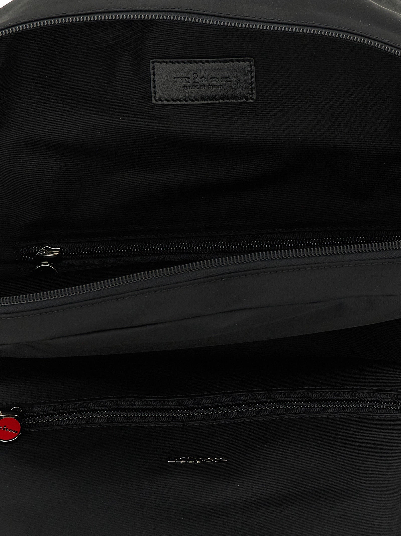 Backpack by Kiton for men in polyamide leather & canvas black & red features a utilitarian chic Polyamide Leather & Canvas Backpack design with a secure zipper, ample external-pockets, and versatile handle, backpack-strap & adjustable-strap for a utilitarian chic finish.