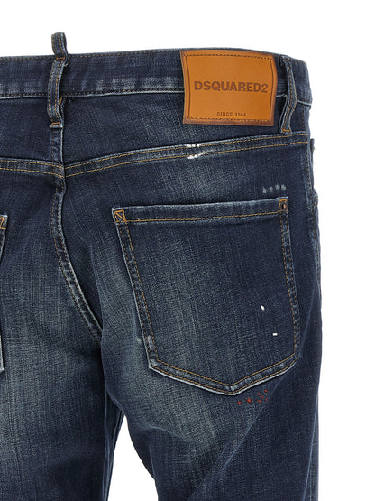 Jeans by Dsquared² for men in stretch denim cotton canvas blue, red & signature presents a tailored silhouette, showcasing a tailored straight-leg and long cut with a refined for a truly tailored aesthetic.