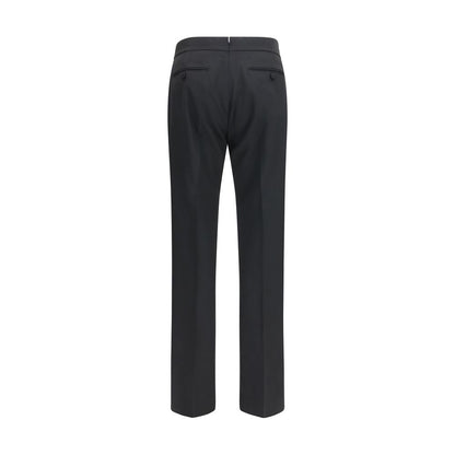 Trousers by Tom Ford for men in wool black features a tailored silhouette with a tailored straight-leg & regular-fit, defined by its long and a sophisticated .