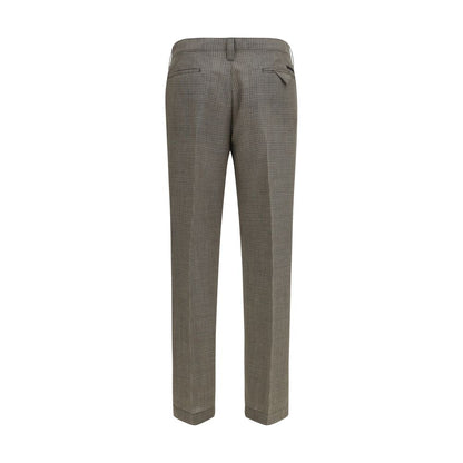 Trousers by Prada for men in wool brown, patterned & checked presents a smart silhouette, meticulously detailed with a smart regular-fit & slim, a smart long, and a smart .