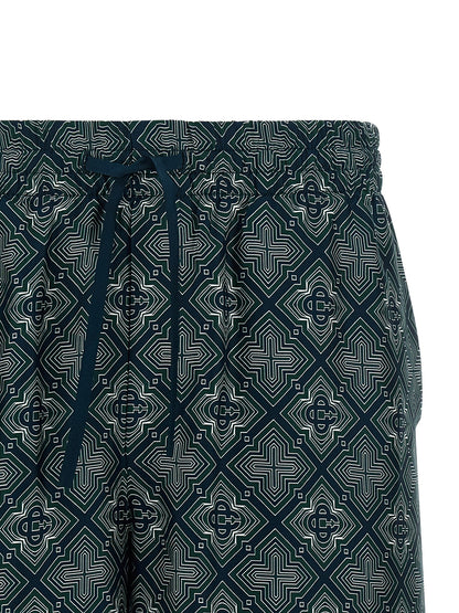 Bermuda Shorts by Casablanca for men in silk dark-green, multicolor, navy, patterned & monogram features an nuanced silhouette, showcasing a nuanced relaxed-fit with a short cut and for a sophisticated, premium finish.