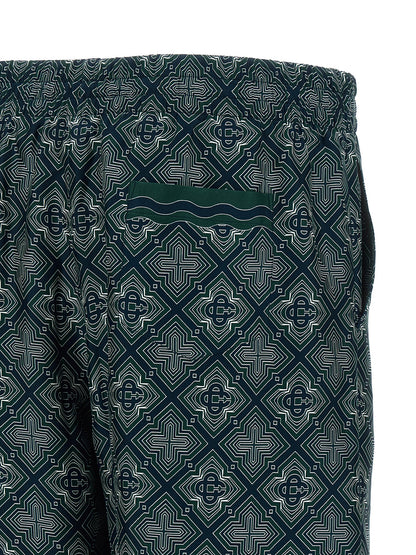 Bermuda Shorts by Casablanca for men in silk dark-green, multicolor, navy, patterned & monogram showcases a on trend silhouette, featuring a tailored relaxed-fit with a classic short and sophisticated for a on trend finish.