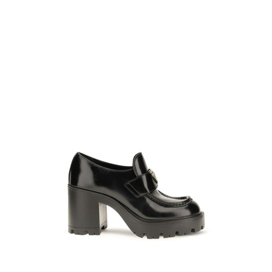 Platform Loafer Shoes by Prada for women in bos taurus calf leather black showcases a impeccable silhouette as Women's Bos Taurus Calf Leather Platform Loafer Shoes, artfully designed with a impeccable platform and refined for a impeccable finish.