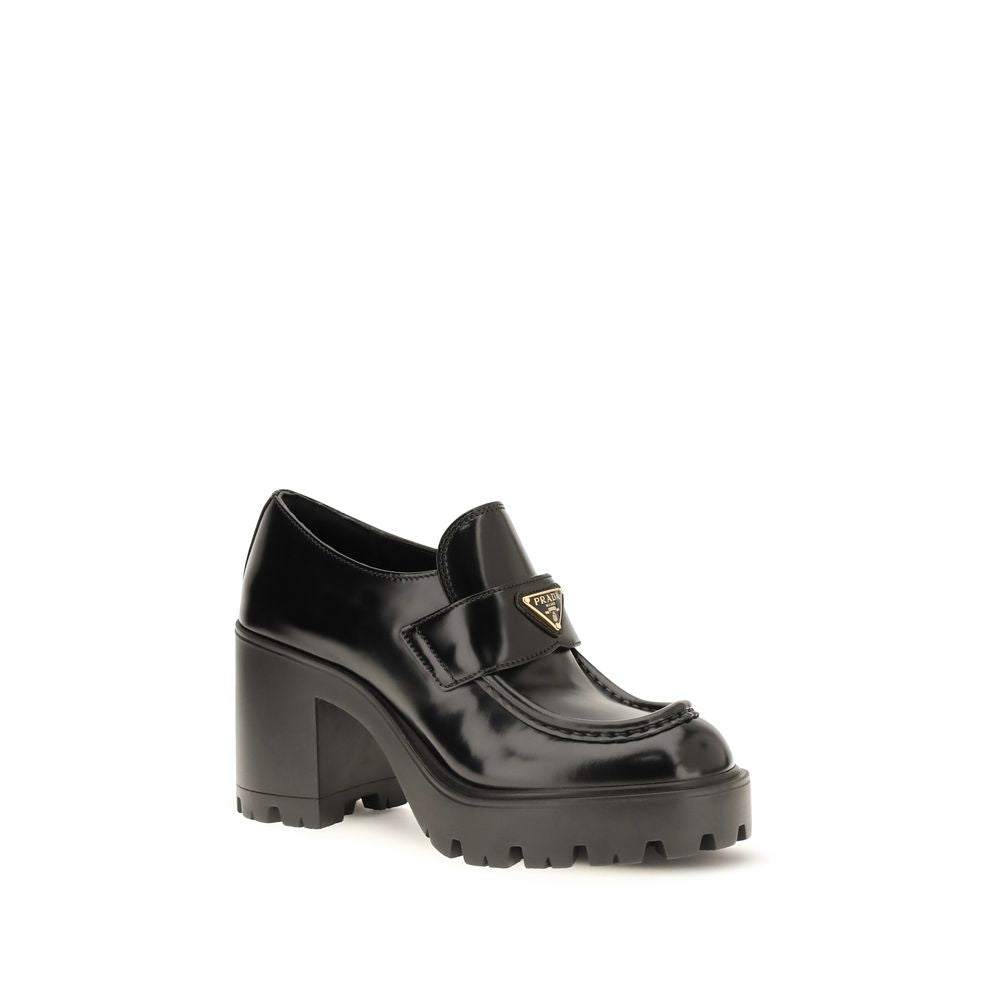 Platform Loafer Shoes by Prada for women in bos taurus calf leather black features an dynamic silhouette from the Women's Bos Taurus Calf Leather Platform Loafer Shoes collection, defined by a dynamic and platform for a dynamic look.