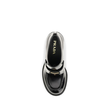 Platform Loafer Shoes by Prada for women in bos taurus calf leather black features an ergonomic silhouette, perfectly showcasing Women's Bos Taurus Calf Leather Platform Loafer Shoes with its distinct platform and elegant .