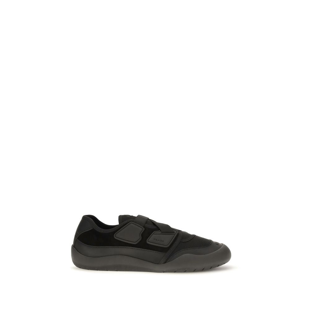 Sneakers by Prada for men in cotton & nylon black presents a on trend silhouette from the Men's Low Top Cotton & Nylon Sneakers collection, showcasing a on trend low-top style for an elevated aesthetic.