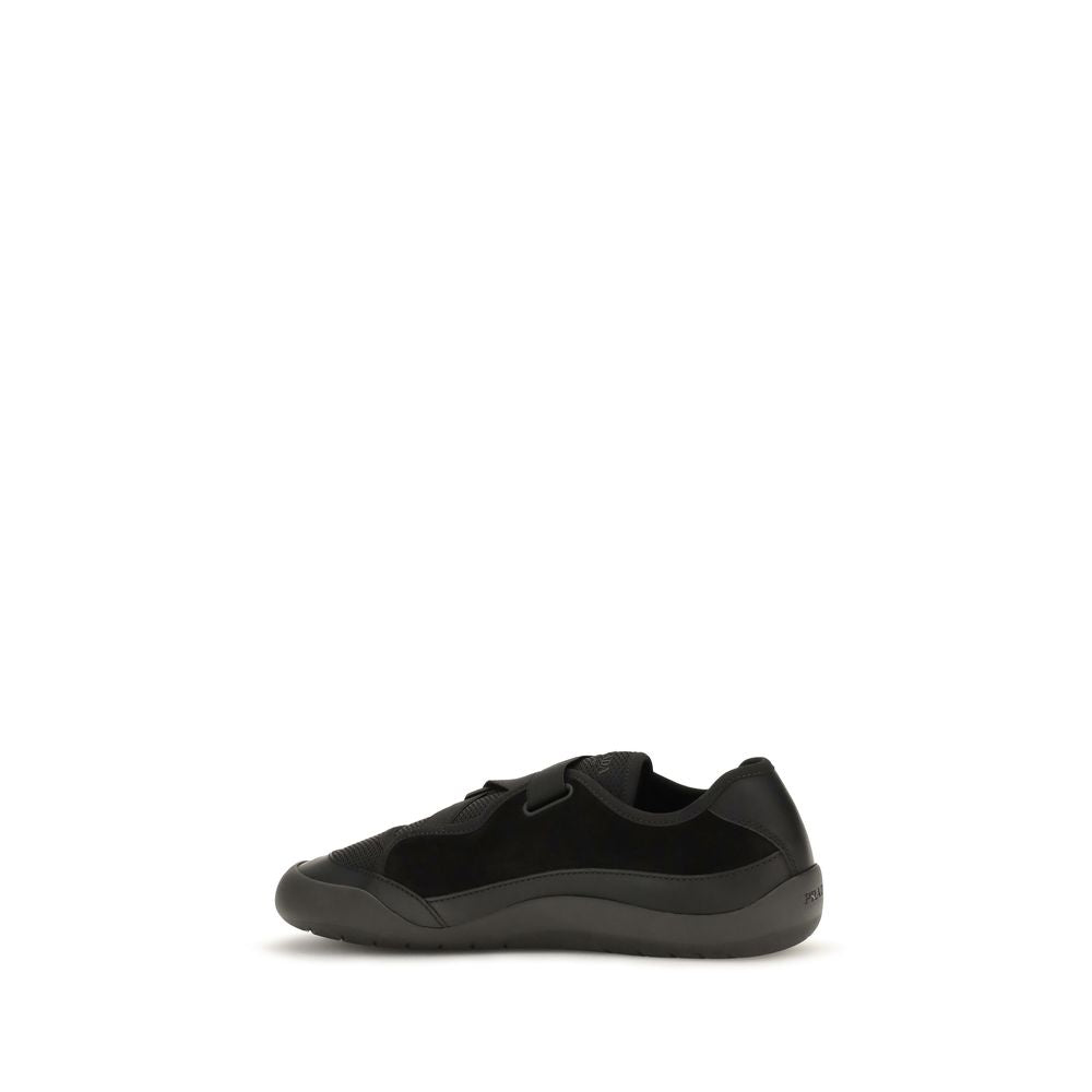Sneakers by Prada for men in cotton & nylon black features a chic design, perfectly showcasing the chic low-top style of this Men's Low Top Cotton & Nylon Sneakers.