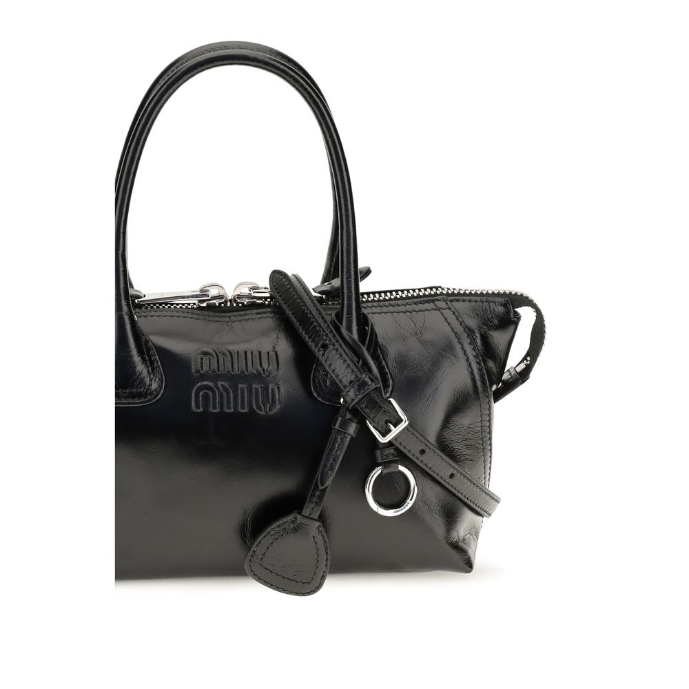 Handbag by Miu Miu for women in bos taurus calf leather black features a contemporary silhouette, showcasing a secure , ample , and contemporary for a sophisticated look.