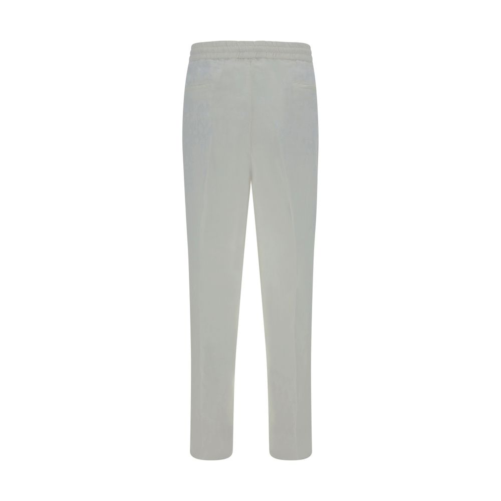 Casual Pants by Brunello Cucinelli for men in linen white presents a refined pantology silhouette, artfully defined by a refined pantology regular-fit, long, and a sophisticated .