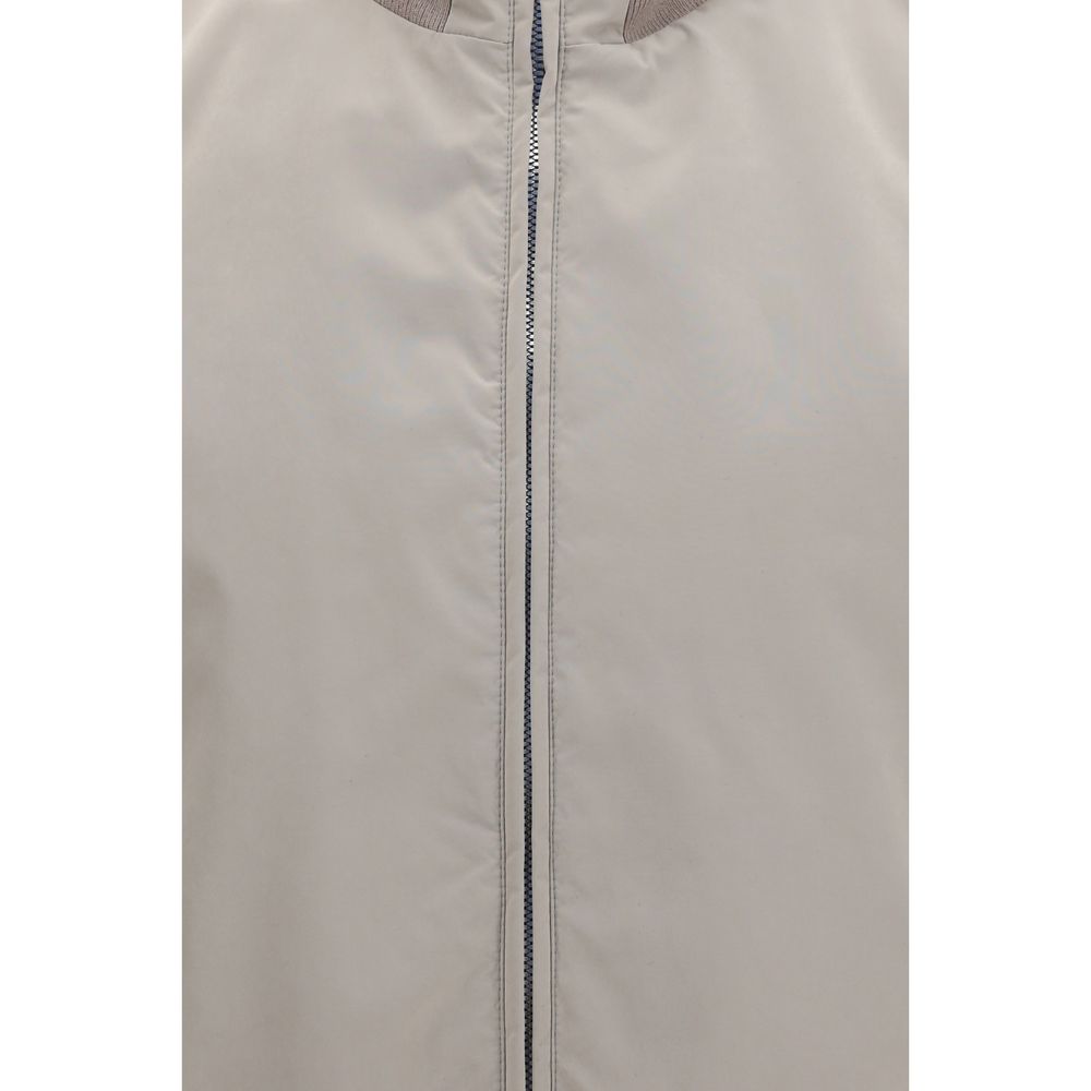 Vest by Brunello Cucinelli for men in polyamide & polyester gray showcases a dynamic silhouette, perfectly balancing pockets with a dynamic for a sophisticated, high-fashion look.