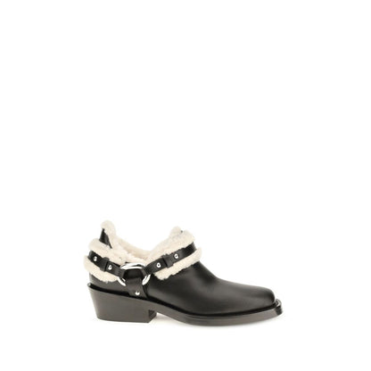 Ankle Biker Boots by Rabanne for women in bos taurus calf leather black features an enchanting design from the Women's Bos Taurus Calf Leather Ankle Biker Boots collection, highlighting a enchanting and for a refined look.