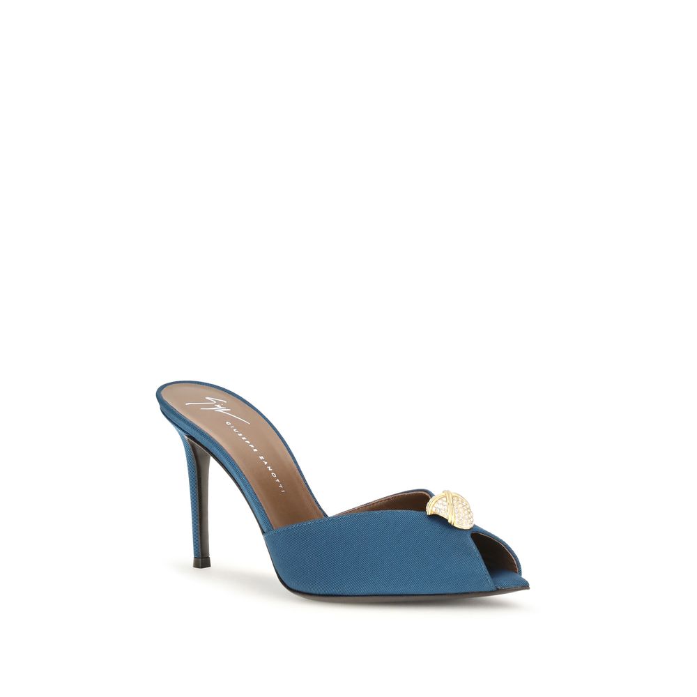 Stiletto Mules Sandals by Giuseppe Zanotti for women in bos taurus calf leather & rhinestone blue & gold features an effortlessly chic silhouette from the Women's Bos Taurus Calf Leather & Rhinestone Stiletto Mules Sandals collection, showcasing a effortlessly chic stiletto and elegant pointed toe style.