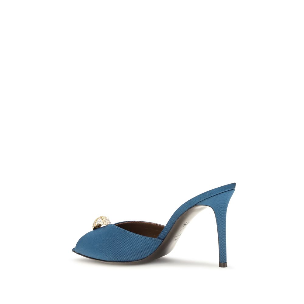 Stiletto Mules Sandals by Giuseppe Zanotti for women in bos taurus calf leather & rhinestone blue & gold showcases a sculptural silhouette as Women's Bos Taurus Calf Leather & Rhinestone Stiletto Mules Sandals, defined by a sculptural stiletto and sculptural pointed toe style for a sculptural look.
