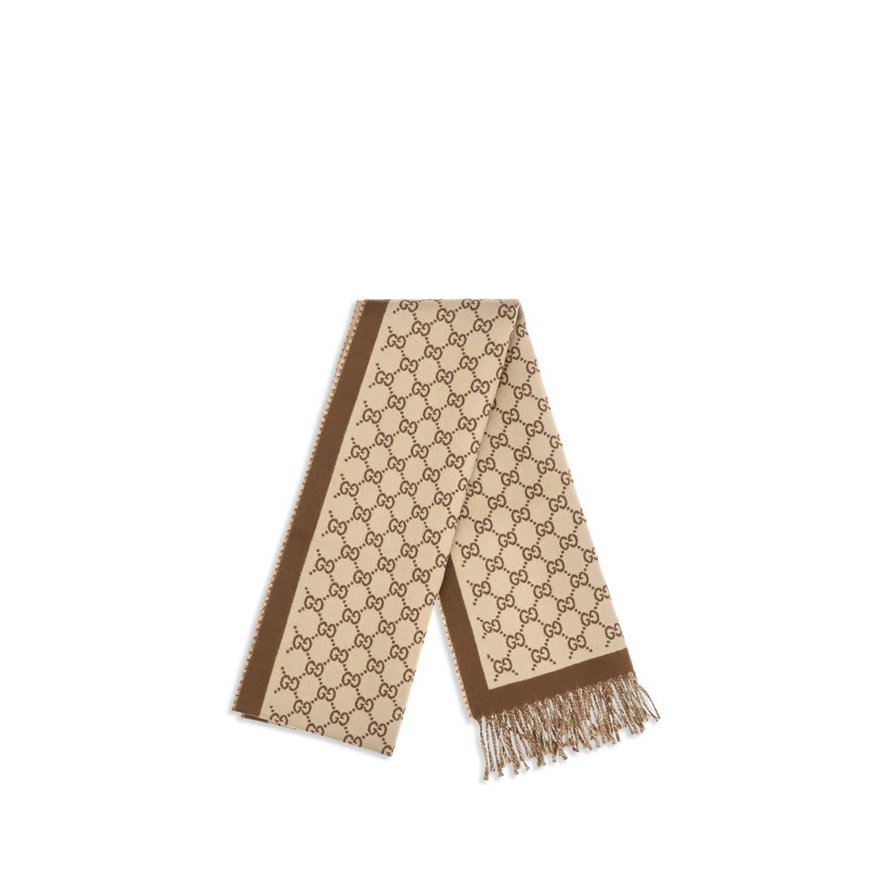 Scarf by Gucci for women in merino wool beige showcases a on trend silhouette, artfully capturing the on trend essence of the Gg Merino Wool Fringes Scarf design with a sophisticated finish.