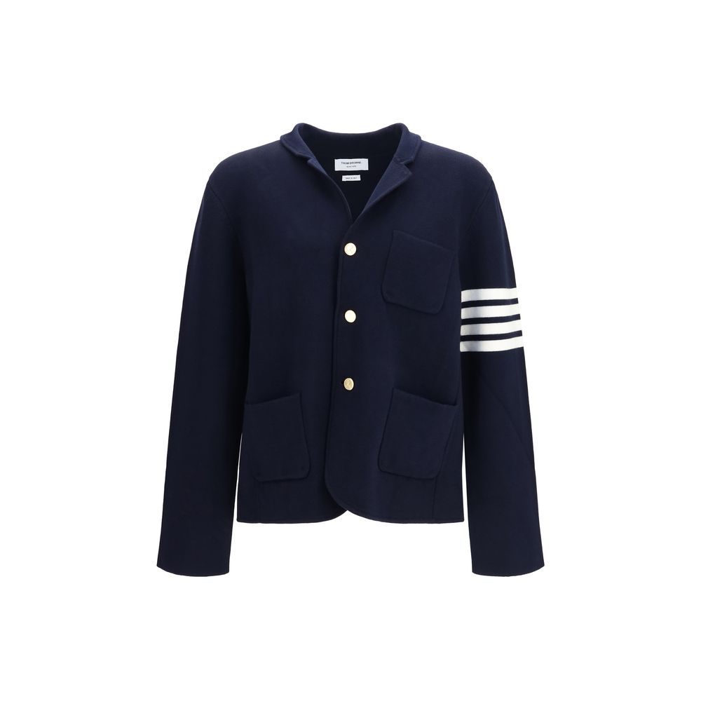Overcoat by Thom Browne for men in polyamide & wool blue, signature & striped presents a luxurious silhouette, showcasing a luxurious and sophisticated pockets for a premium, luxurious look.