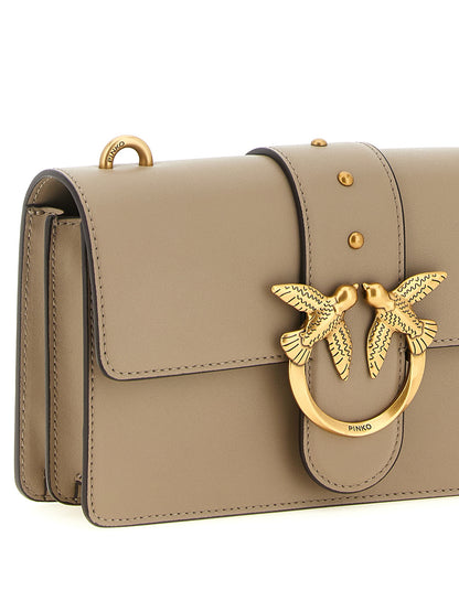 2-in-1 Shoulder & Crossbody Handbag by PINKO for women in bos taurus calfskin leather gray & gold features an versatile silhouette, showcasing a secure buckle and versatile with versatile crossbody-strap, shoulder-strap & adjustable-strap for a versatile finish.