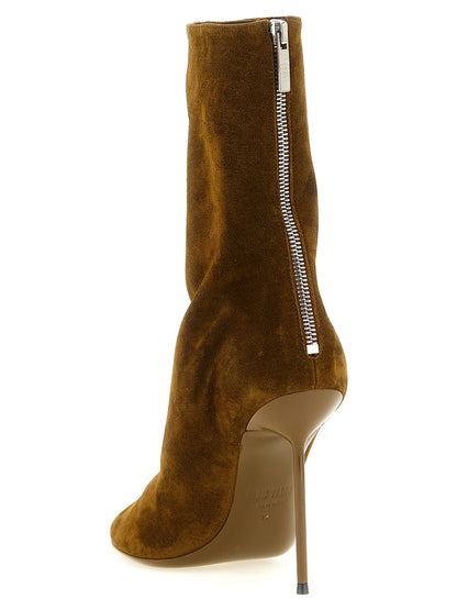 Stiletto Ankle Boots by Paris Texas for women in bos taurus suede calfskin leather brown & silver showcases a ergonomic silhouette from the Lidia Women's Bos Taurus Suede Calfskin Leather Stiletto Ankle Boots collection, featuring a ergonomic stiletto and a ergonomic .